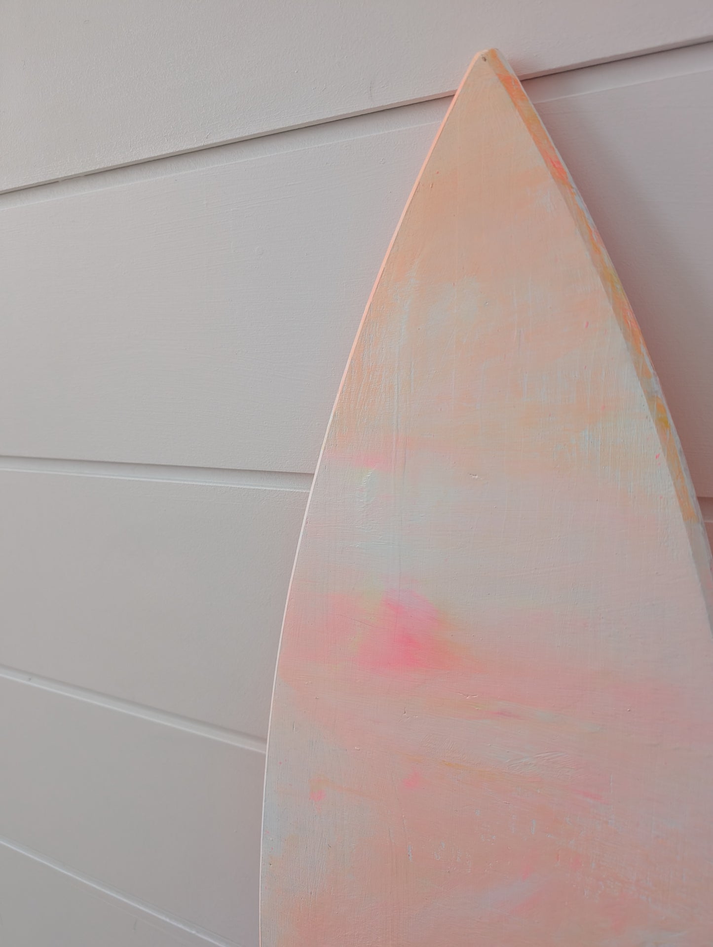 double-sided_surfboard_wall_art_painting_in_peach_coral_and_white_acrylic_on_wood