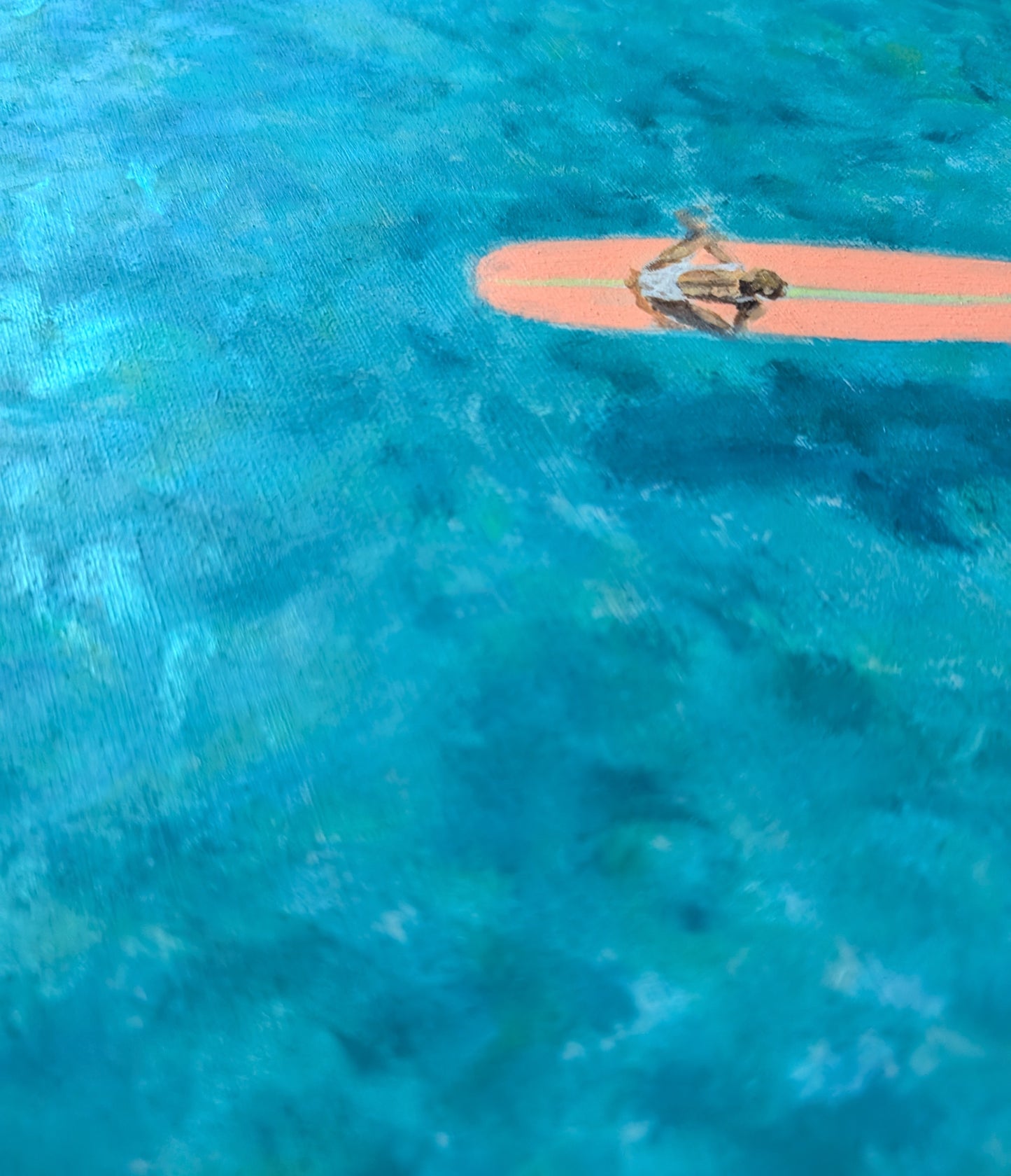 Teal ocean surfer painting on wood panel, aerial view of woman on coral pink surfboard in turquoise water